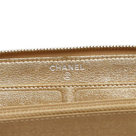 chanel metallic calfskin camellia zip around wallet|Wallet on chain .